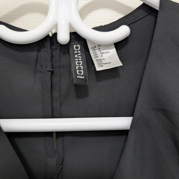 Black Ruffled Short Sleeve Romper - Picture 3 of 3